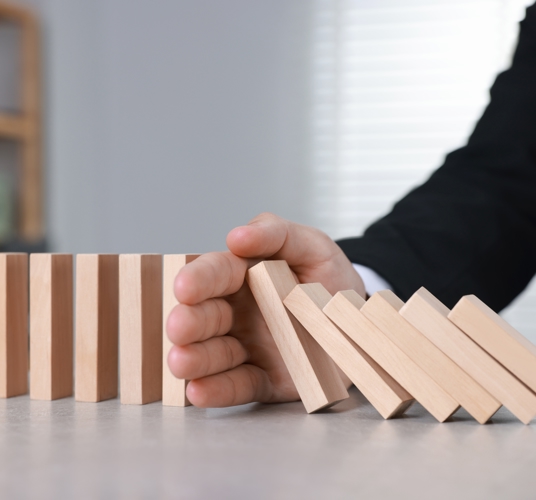 Shutterstock 2593319407 Domino Effect